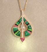 Yellow gold highlighted by Diamonds, Pink Tourmaline, and natural color minerals including
Black Jade, Gaspeite, Malachite, and Pink Rhodinite. Great for lunch or dinner.