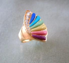What's to say !! Colors of the minerals are striking. Diamonds add a graceful
curve. Overall Marquis shape is lovely.